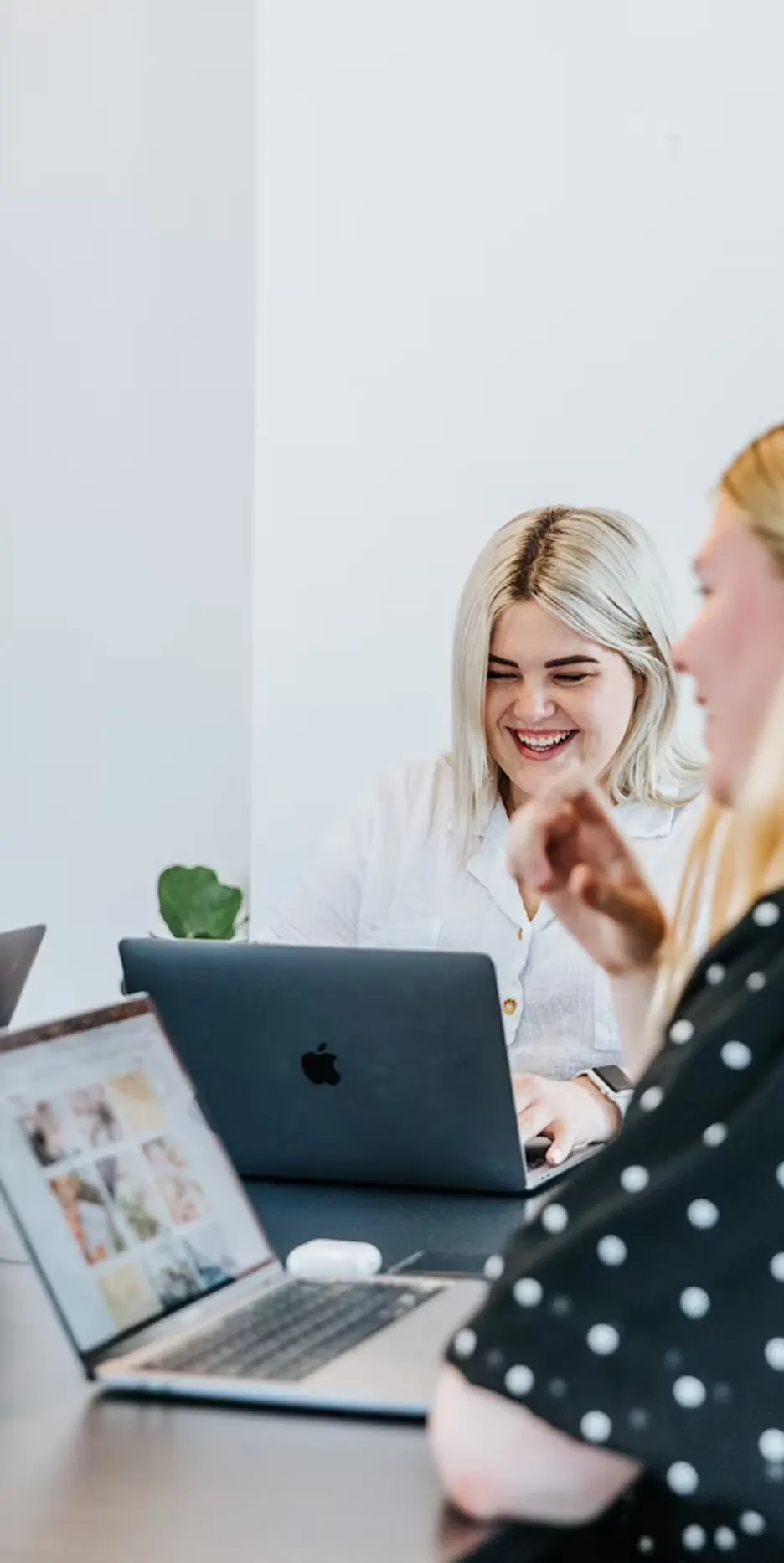 Happy office workers collaborating